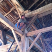 Mitch climbing up and down the barn